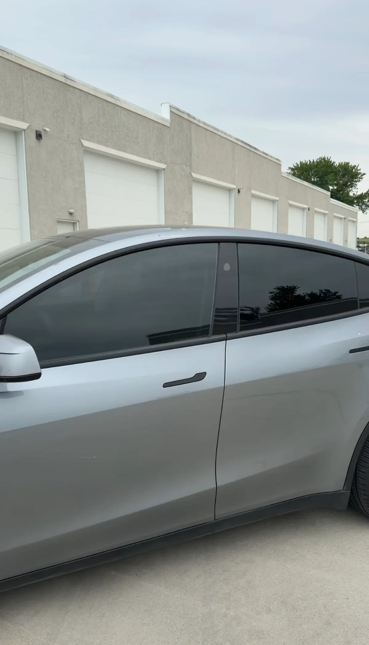 Silver sedan finished with dark ceramic window tint